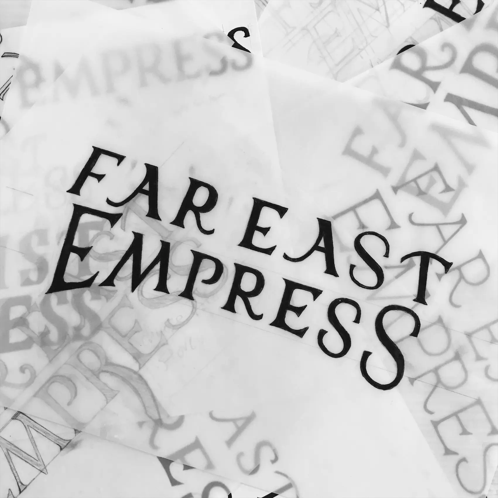 Printed wordmark studies on overlapping paper